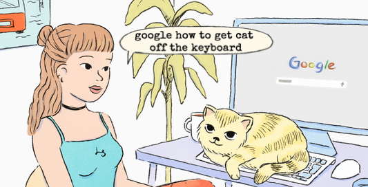 Girl sitting in fron of computer with Google open. A cat is siting on her keyboard are she speaks to her computer using LipSurf saying " google how to get cat off the keyboard"